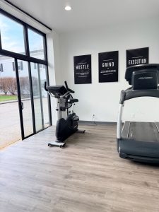 Treadmills and exercise bikes in the renovated fitness area at Aurora Swim Center in Aurora, Ohio